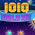 Έγχρωμη εικόνα με τον τίτλο 1010 DELUXE σε έντονα γράμματα, πλαισιωμένη από πολύχρωμα διαμάντια σε ένα νυχτερινό ουρανό με αστέρια