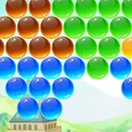 Μπάλες διαφόρων χρωμάτων τοποθετημένες σε σειρές με φόντο τοπίο