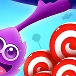 Μωβ χαρούμενος χαρακτήρας με μεγάλα μάτια και καραμέλες σε φόντο γαλάζιο
