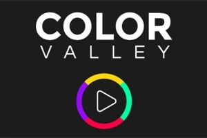 Λογότυπο με τη φράση COLOR VALLEY και έναν πολύχρωμο κύκλο με σύμβολο αναπαραγωγής στο κέντρο, σε μαύρο φόντο