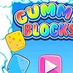 Γράμματα με ουράνιο τόξο στη λέξη Gummy Blocks, πλαίσια με καραμέλες και κουμπί αναπαραγωγής σε φόντο με σύννεφα