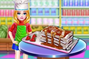 Μια νεαρή κοπέλα με ποδιά και καπέλο σεφ στέκεται δίπλα σε μια τούρτα με φράουλες και σιρόπι πάνω σε τραπέζι σε πολύχρωμο φόντο καταστήματος