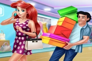 Γυναίκα με κόκκινα μαλλιά κρατάει μια τσάντα σε κατάστημα ενώ ένας άντρας δίπλα της κουβαλά πολλά πολύχρωμα κουτιά