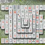 Πλακίδια Mahjong τοποθετημένα σε σχηματισμό πάνω σε πράσινο φόντο