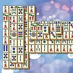 Πλακίδια με διάφορα σύμβολα και χρώματα τοποθετημένα σε σχηματισμό με φόντο θολές φωτεινές κουκκίδες