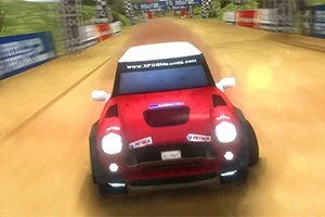 Rally Point 2 Κόκκινο αυτοκίνητο αγωνιστικού τύπου κινείται σε χωμάτινη πίστα με γραμμές τερματισμού και διαφημιστικές πινακίδες στο φόντο