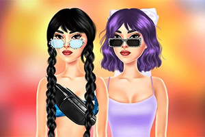 Δύο γυναίκες με γυαλιά ηλίου, η μία με μαύρες πλεξούδες και μαύρο τοπ με τσαντάκι μέσης και η άλλη με κοντά μωβ μαλλιά και λιλά φόρεμα, σε πολύχρωμο φόντο